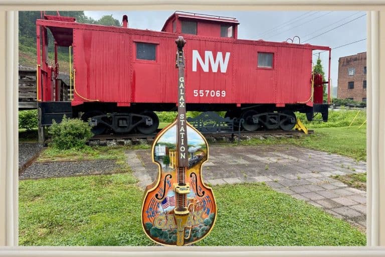 red train and painted music art at the trailhead of the New River Trail State Park entrance at Galax