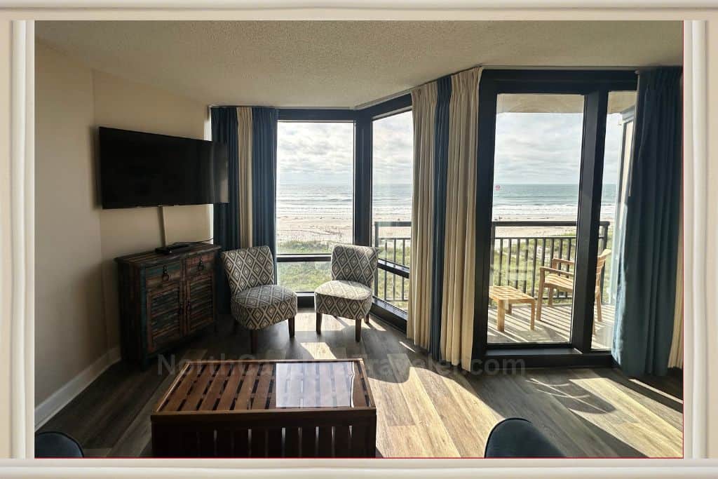living area showing floor to ceiling windows at Shell Island Resort

Shell Island Resort Wrightville Beach NC