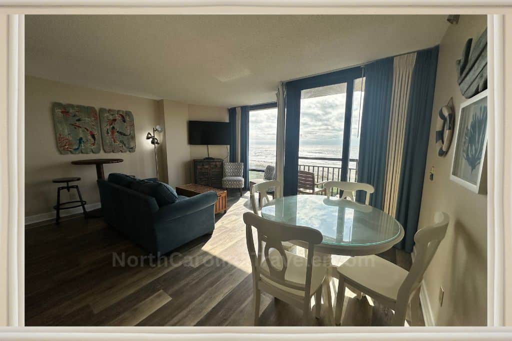 traditional suite 1 King bd with sleeper sofa, living area. 

Shell Island Resort Wrightville Beach NC